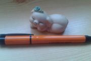 Sleepy little pig ornament