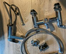 Bath and sink mixer taps and shower head