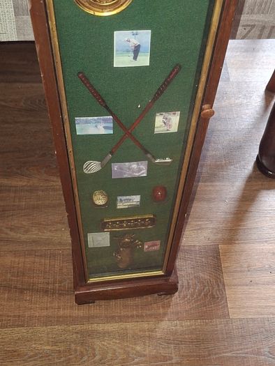 Beautiful Wooden Golf-Themed Shadow Box and Storage Unit with Shelves Cabinet, featuring a glass door front Inside the glass display panel, it showcases a vintage-style collage celebrating the history of golf,