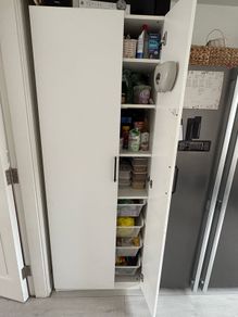storage cabinet with pull out baskets