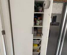 storage cabinet with pull out baskets