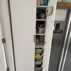 storage cabinet with pull out baskets
