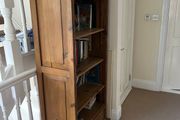 Solid wood bookshelf with bottom drawer