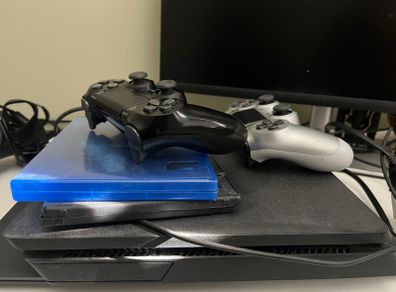 PS4 Slim with 2 Controllers