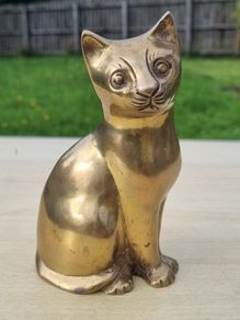 Vintage brass figurine of a sitting cat