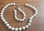 Elegant pearl necklace and bracelet.