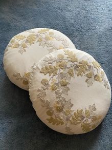 Feather filled round cushions