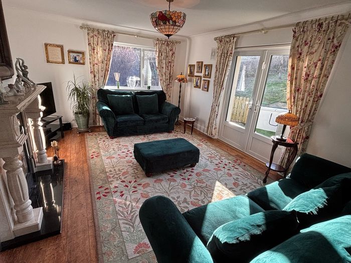 Elegant three piece suite with matching footstool
