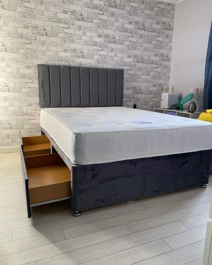 Double bed and mattress having headboard