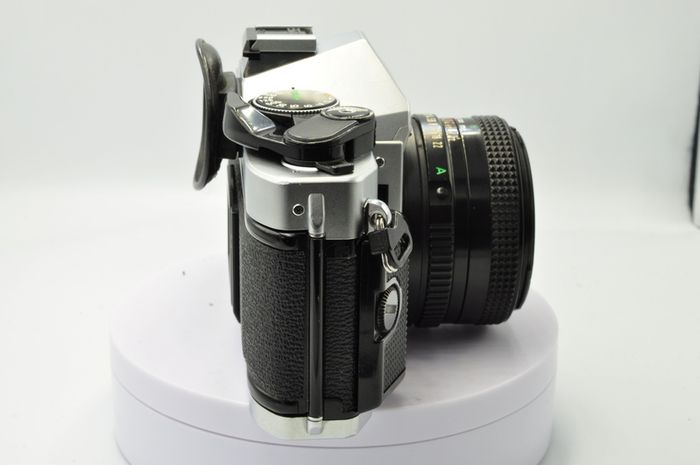 Canon AE-1 Program Silver/ Chrome 35mm SLR Film Camera with fast Canon FD 50mm f1. 8 FDn, Recently FULLY SERVICED and in Good Condition.