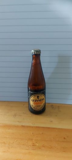 Vintage original Guinness miniature advertising bottle,with liquid inside some of of it must of evaporate,,hard to come by ,price includes free shipping within Ireland thank you, sold as seen, see pictures,,