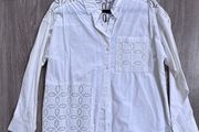 New stylish white button-up blouse, a crisp cotton intricate cutwork (broderie anglaise) panels