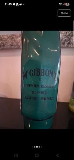 Stunning vintage McGibbon's ceramic golf bag whiskey decanter