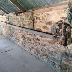 Grain auger and roller