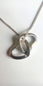 Sterling silver double heart necklace with real diamond accent