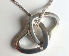 Sterling silver double heart necklace with real diamond accent