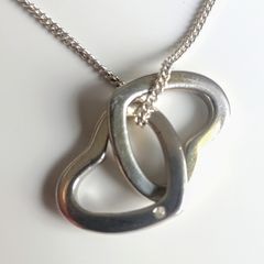 Sterling silver double heart necklace with real diamond accent