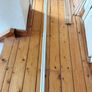 Two 2.4m lengths of white wooden moulding 10x10mm Image 8