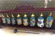 Enamel cloisonne graduated bells on wooden stand