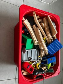 Bundle of wood train tracks and toys