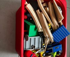 Bundle of wood train tracks and toys