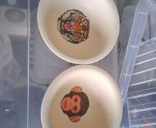 two plastic bowls