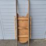 These are vintage wooden snow sleds Image 4