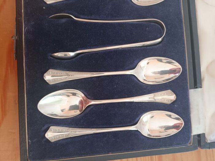 Set of 6 Tea Spoons and  matching Sugar Nips