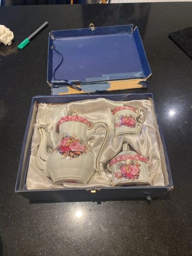 Vintage Porcelain small teapot sugar bowl and creamer set .       porcelain