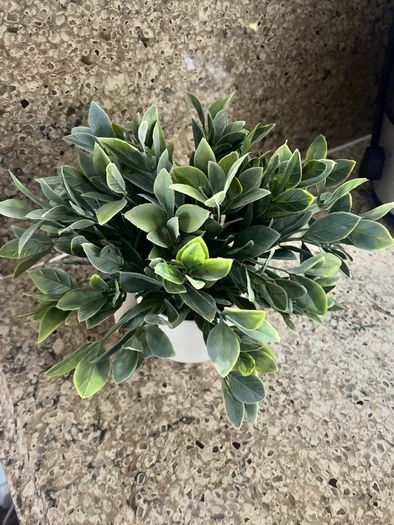 artificial plant in white pot home decor