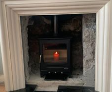 Cream marble fireplace/stove surround