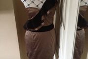 Beautiful one shoulder tan dress with black velvet ruffle on shoulder