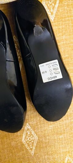 Black patent peep toe shoes