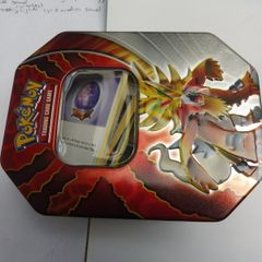 Pokemon Trading Card Game Gouging Fire tin box with bulk cards