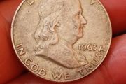 Franklin half dollar (D).