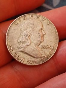 Franklin half dollar (D).