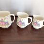 Vintage Edwardian Lady in flower garden set of three graduating  water jugs Image 2