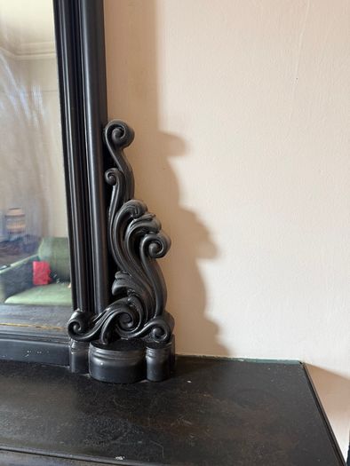 Black over mantle mirror
