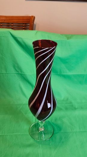 Elegant Murano-style vase made of art glass in ruby red with white spiral stripes