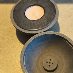 A cast with marble insert  4-in-1  paper wight ,candle holder, tea light holder, and A incense holder designed ball.
