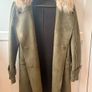 olive green faux-suede double-breasted coat featuring a prominent plush F U R colla Image 4