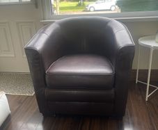 Brown leather bucket seat