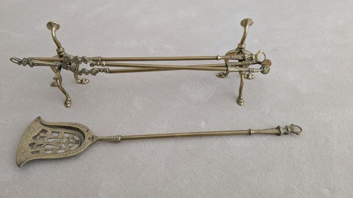 Brass fireplace fender and companion set