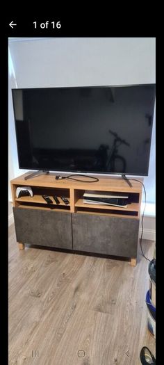 TV Table Excellent condition like new used for 65" and bigger
