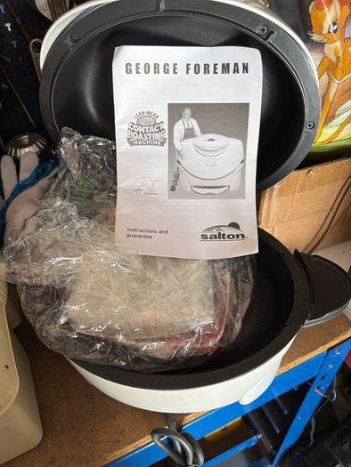 George Foreman contact roasting machine