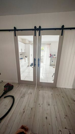 sliding doors with rail same as new..need gone as moving this weekend