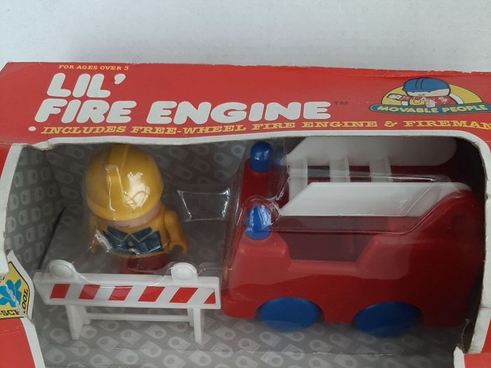 Vintage fire engine with play people and fireman Sam jigsaws