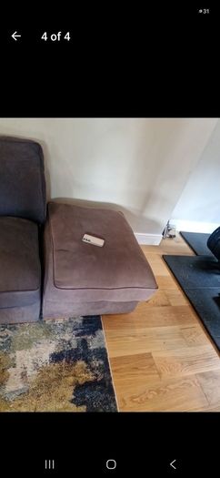 free sofa and large pouffe