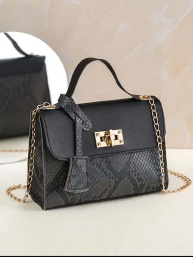 Black snakeskin twist lock bag