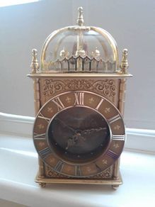 Rhythm Mantle Clock